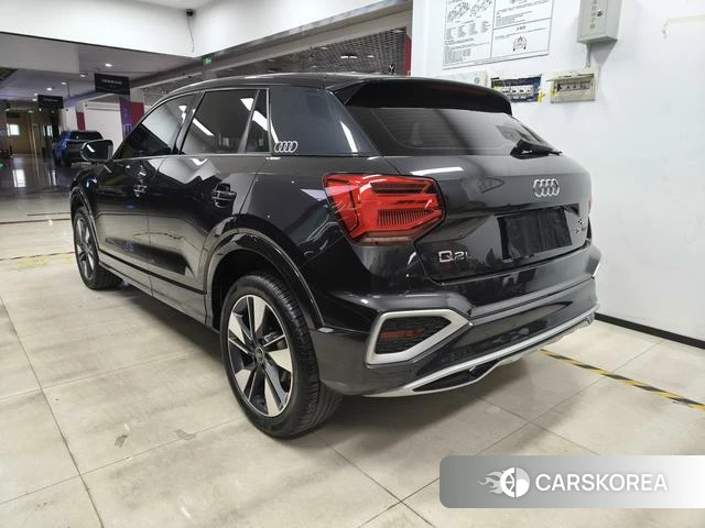 Audi Q2L 2022 Темно-серый из Китая, фото 4