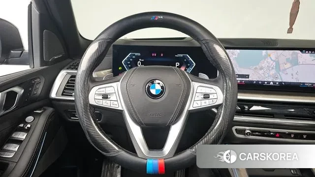 BMW X7 (G07) 2024 Черный из Кореи, фото 4