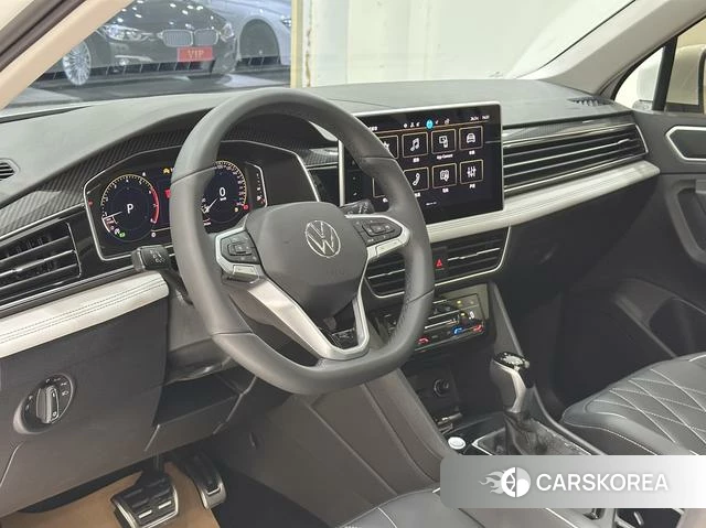 Volkswagen Tiguan L 2024 Белый из Китая, фото 4