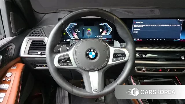 BMW X7 (G07) 2024 Черный из Кореи, фото 4