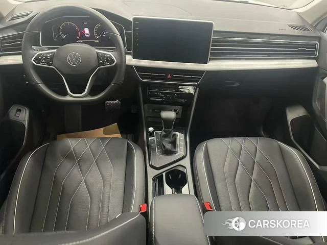 Volkswagen Tiguan L 2023 Белый из Китая, фото 4