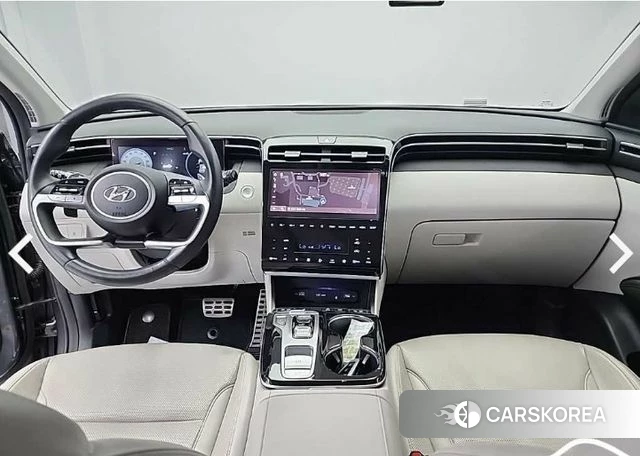 Hyundai Tucson (NX4) 2021 Серебристо-серый из Кореи, фото 4