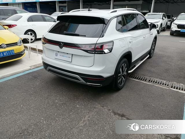 Volkswagen Tanyue 2023 Белый из Китая, фото 4