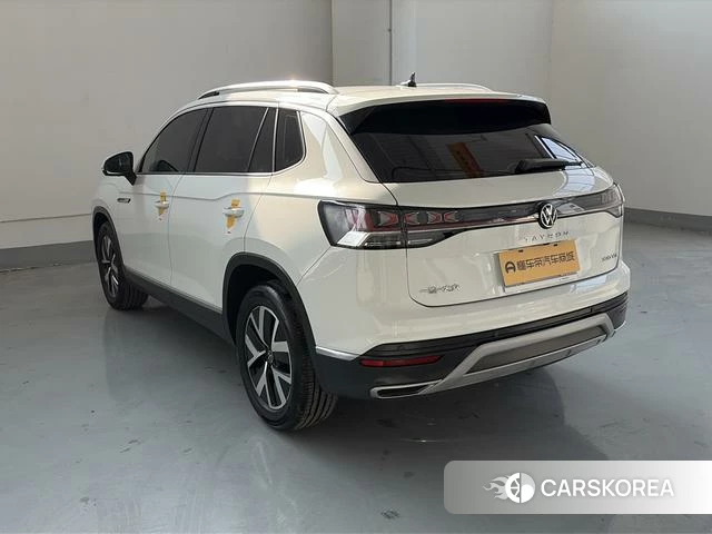 Volkswagen Tanyue 2023 Белый из Китая, фото 4