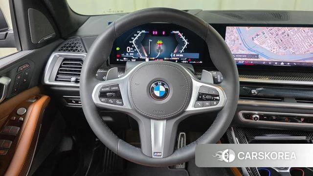 BMW X7 (G07) 2025 Темно-зеленый из Кореи, фото 4
