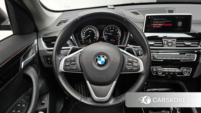 BMW X1 (F48) 2022 Черный из Кореи, фото 4