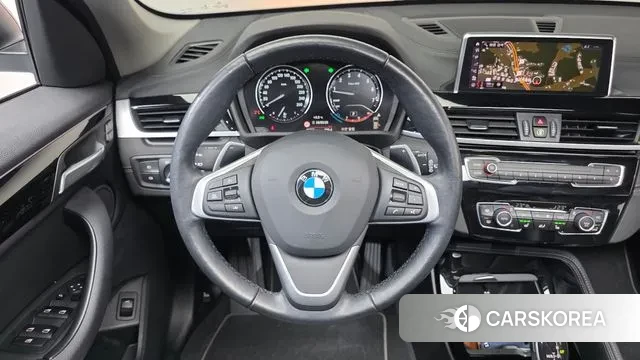 BMW X1 (F48) 2022 Черный из Кореи, фото 4