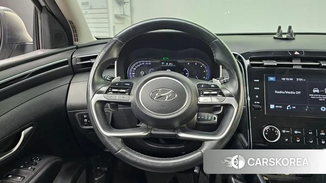 Hyundai Tucson (NX4) 2022 Серебристо-серый из Кореи, фото 4