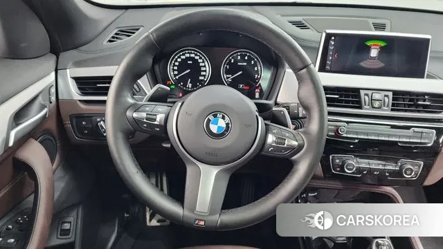 BMW X1 (F48) 2022 Черный из Кореи, фото 4