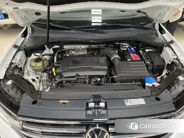 Volkswagen Tiguan L 2023 Белый из Китая, фото 4
