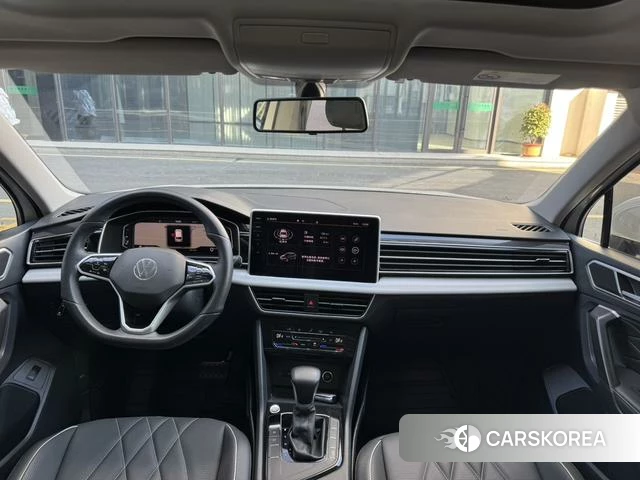 Volkswagen Tiguan L 2023 Белый из Китая, фото 4