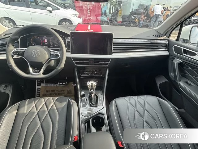 Volkswagen Tiguan L 2023 Белый из Китая, фото 4