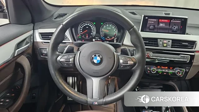 BMW X1 (F48) 2022 Черный из Кореи, фото 4