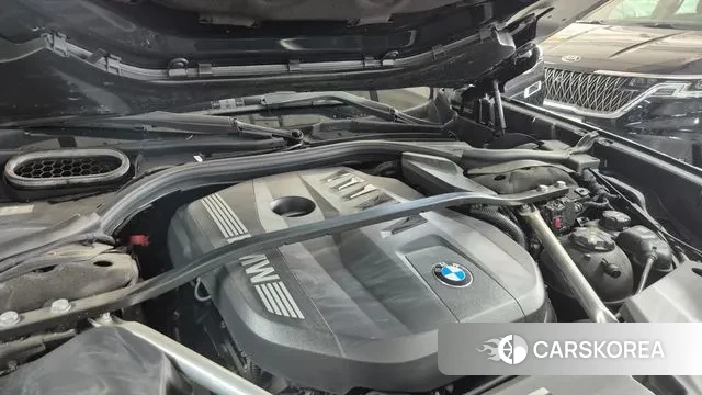 BMW 7 Series (G70) 2023 Черный из Кореи, фото 4