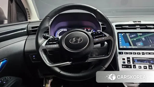 Hyundai Tucson (NX4) 2023 Серебристо-серый из Кореи, фото 4