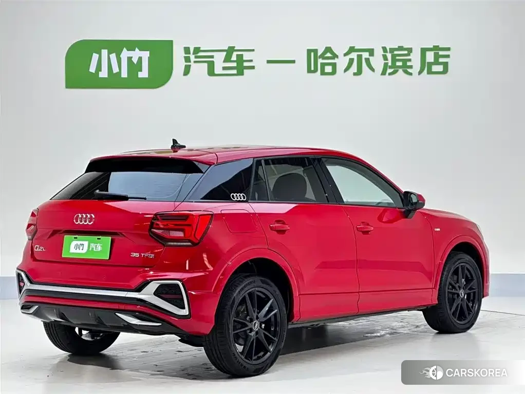 Audi Q2L 2023 Red/purple из Китая, фото 5