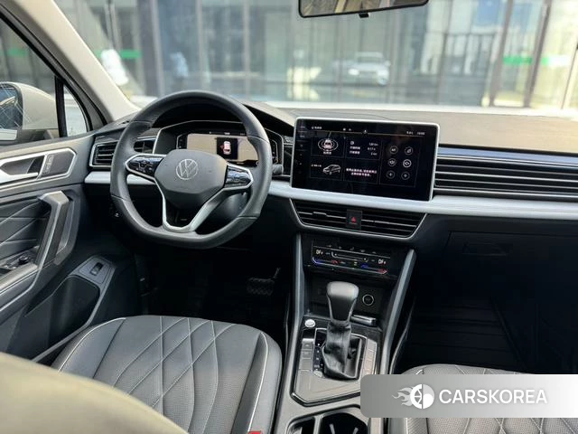 Volkswagen Tiguan L 2023 Белый из Китая, фото 5