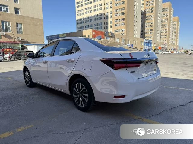 Toyota Corolla dual engine E+ 2020 Белый из Китая, фото 5