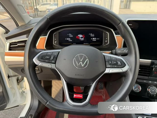 Volkswagen Bora 2023 Белый из Китая, фото 5