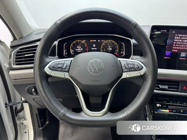 Volkswagen Tanyue 2023 Белый из Китая, фото 6
