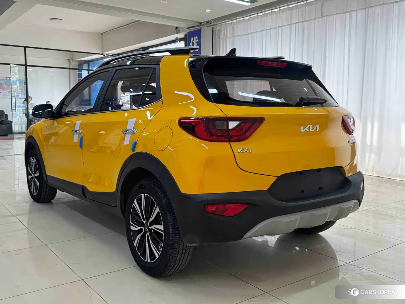 Kia KX1 2022 Yellow/orange из Китая, фото 6