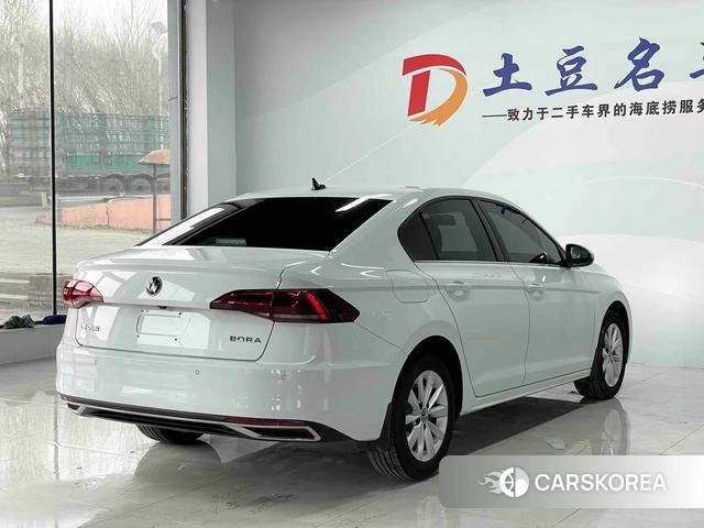 Volkswagen Bora 2022 Белый из Китая, фото 6