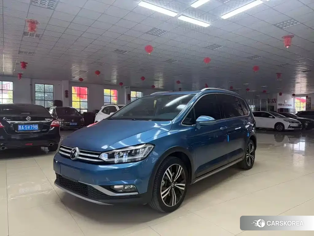 Volkswagen Touran L id 4685902 из Китая 8