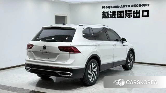 Volkswagen Tiguan L 2023 Белый из Китая, фото 3