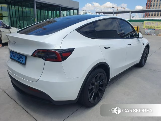 Tesla Model Y 2023 Белый из Кореи, фото 2