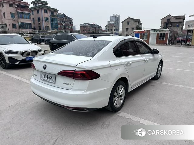 Volkswagen Bora 2021 Белый из Китая, фото 3