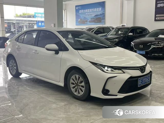Toyota Corolla 2022 Белый из Китая, фото 2