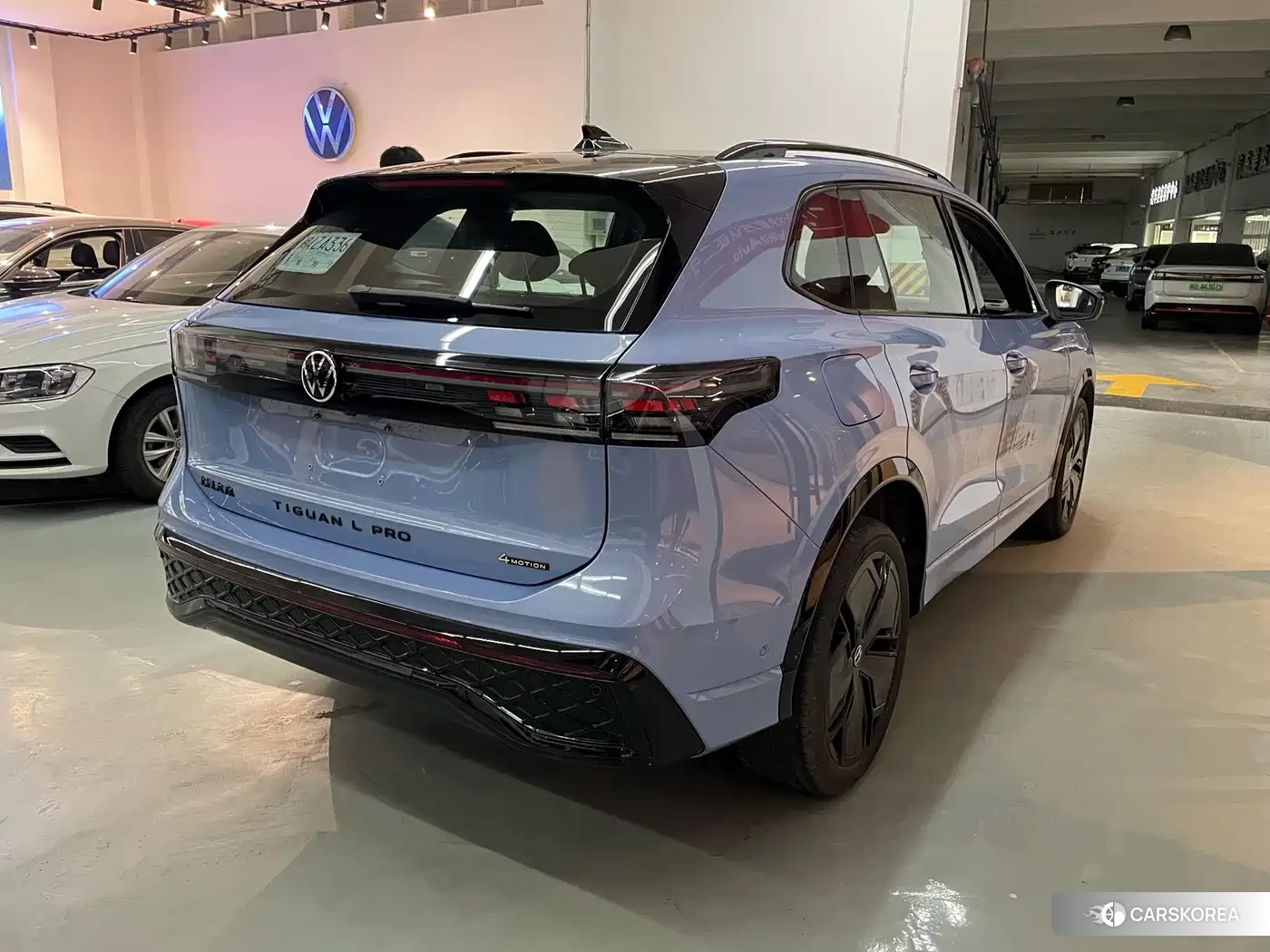 Volkswagen Tiguan L 2024 Синий из Китая, фото 5