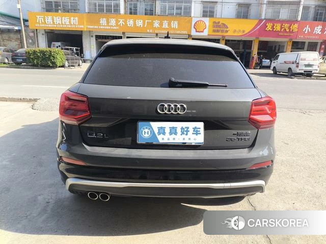 Audi Q2L 2021 Темно-серый из Китая, фото 2