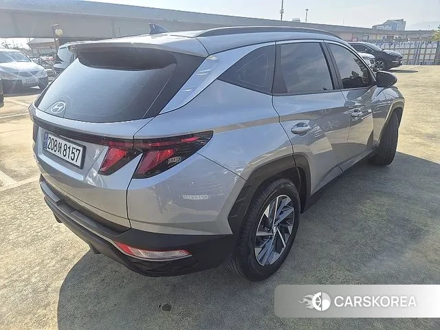 Hyundai Tucson (NX4) 2021 Серебристо-серый из Кореи, фото 5