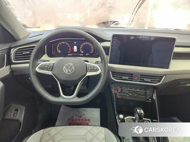 Volkswagen Tanyue 2023 Белый из Китая, фото 2