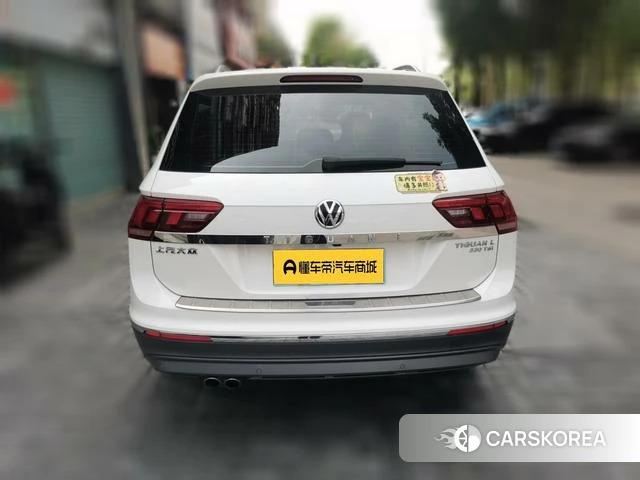 Volkswagen Tiguan L 2018 Белый из Китая, фото 2