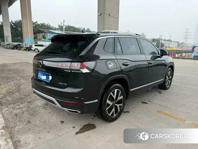 Volkswagen Tanyue 2023 Белый из Китая, фото 2