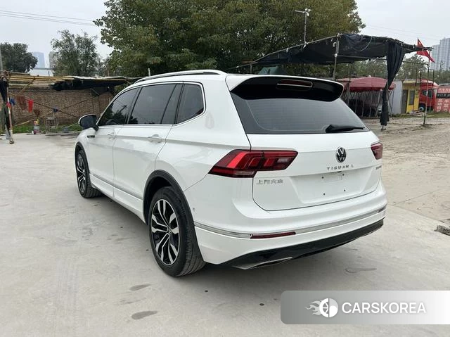 Volkswagen Tiguan L 2021 Белый из Китая, фото 2