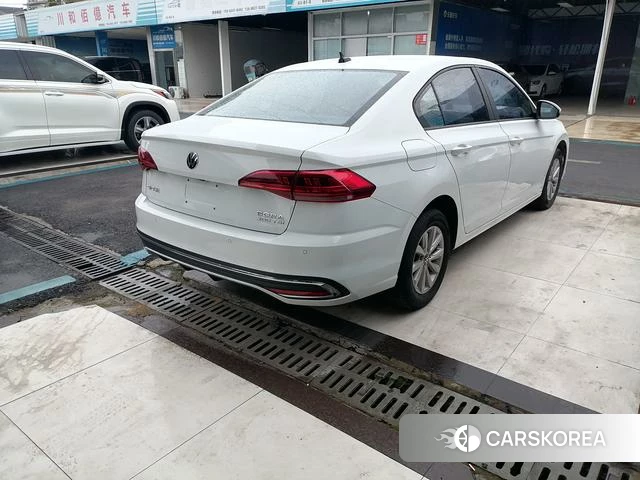 Volkswagen Bora 2024 Белый из Китая, фото 3