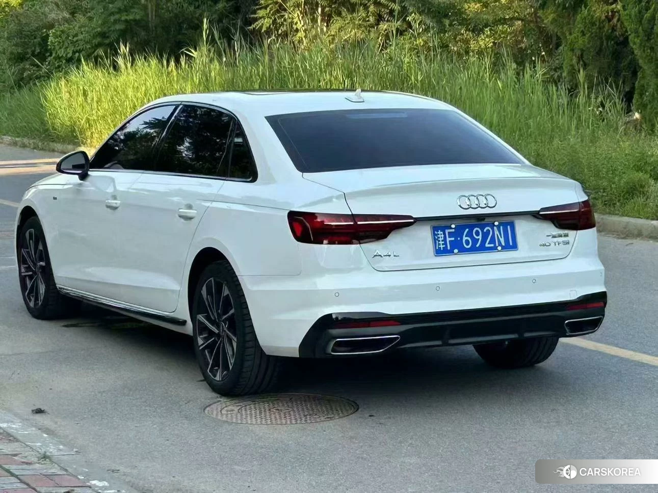Audi A4L 2023 Белый из Китая, фото 2