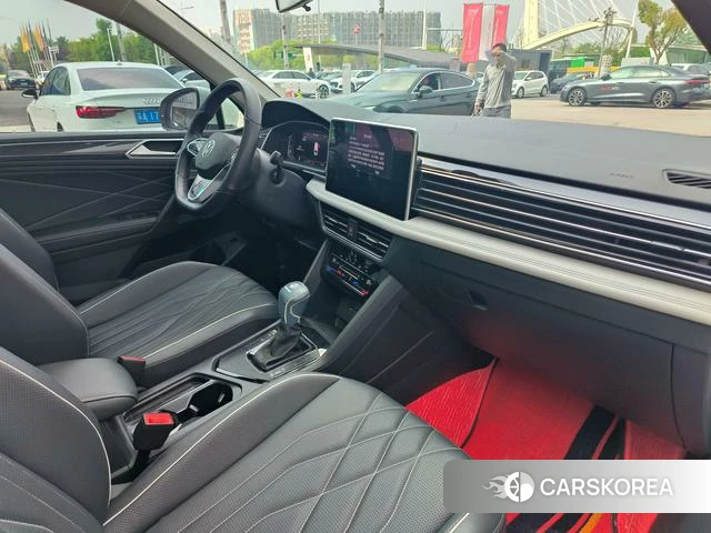 Volkswagen Tiguan L 2023 Белый из Китая, фото 2