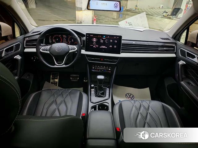 Volkswagen Tiguan L 2024 Белый из Китая, фото 2