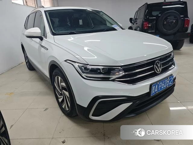 Volkswagen Tiguan L 2023 Белый из Китая, фото 2