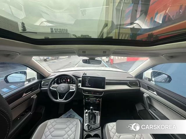 Volkswagen Tanyue 2023 Белый из Китая, фото 2