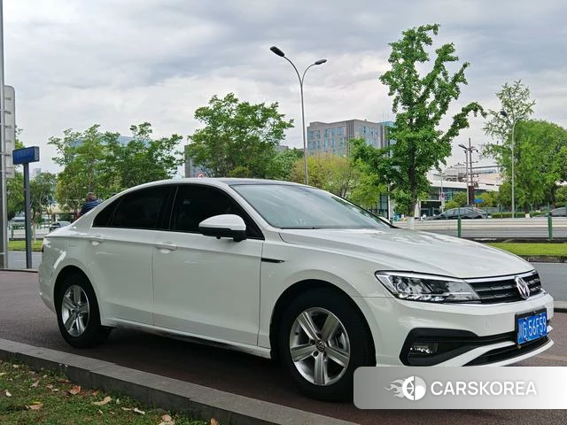 Volkswagen Lingdu 2022 Белый из Китая, фото 2