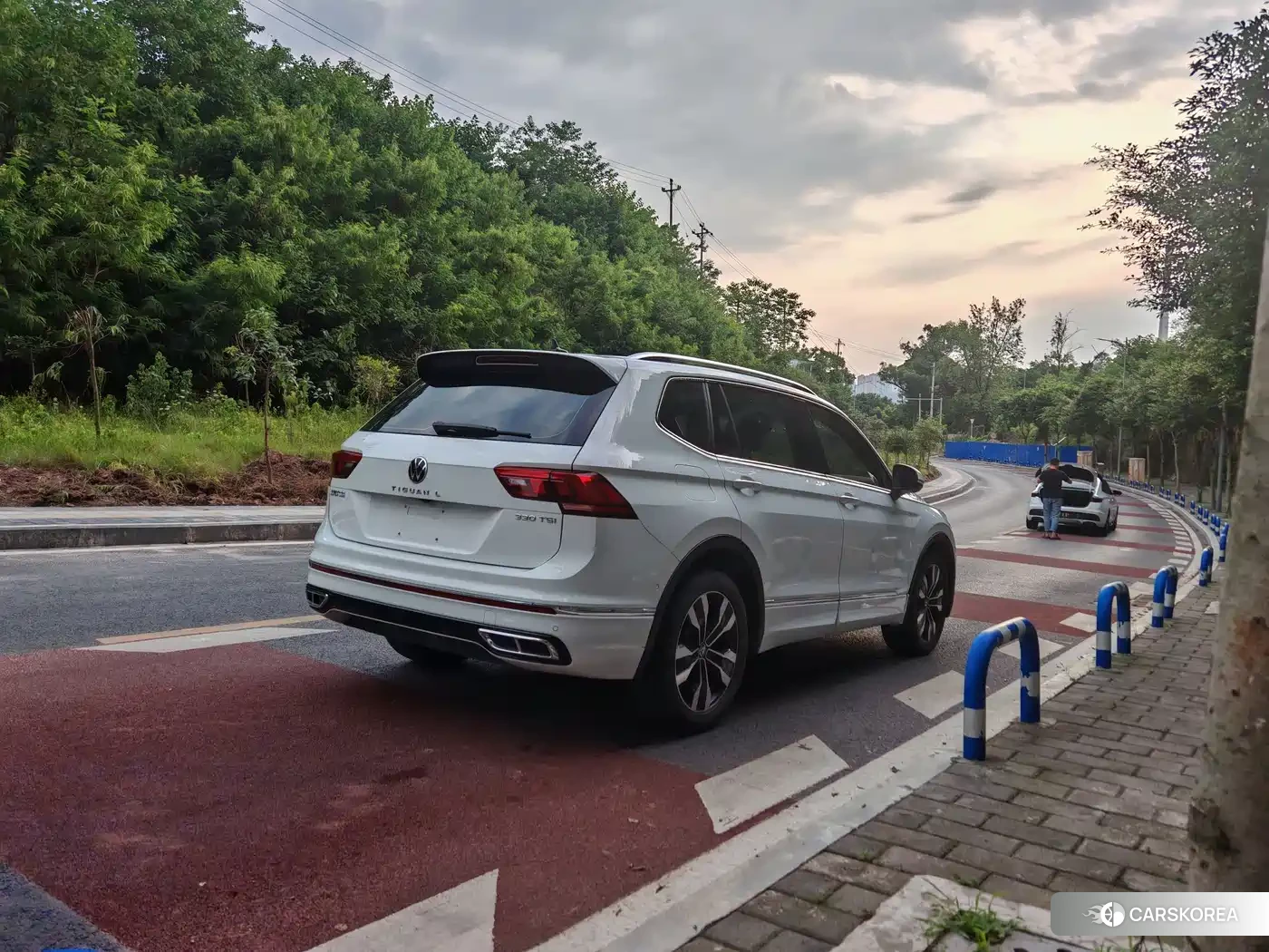 Volkswagen Tiguan L 2024 Белый из Китая, фото 2