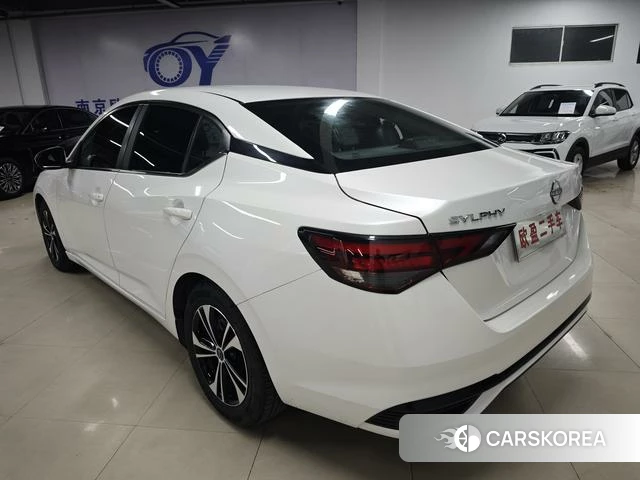 Nissan Xuan Yi 2024 Белый из Китая, фото 2
