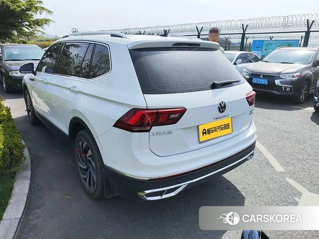 Volkswagen Tiguan L 2023 Белый из Китая, фото 2
