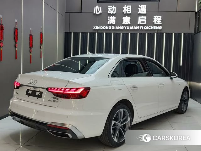 Audi A4L 2021 Белый из Китая, фото 2