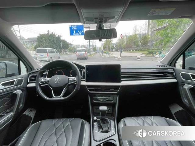 Volkswagen Tiguan L 2023 Белый из Китая, фото 2